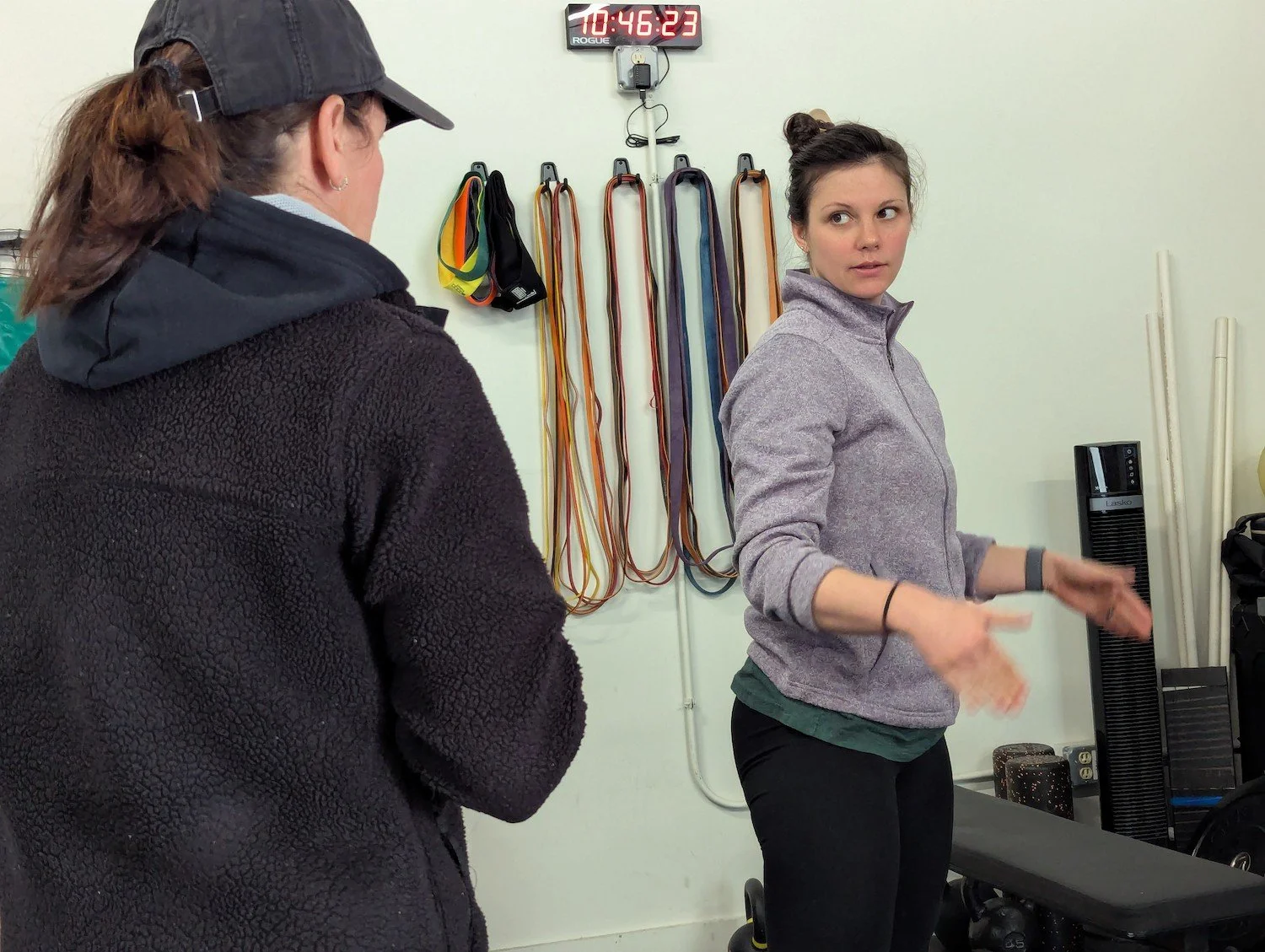 Pelvic physical therapist demonstrating an exercise to a pelvic physical therapy client in South Portland, Maine.