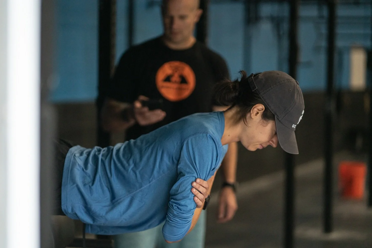 Sport physical therapist helping a client prevent injuries.