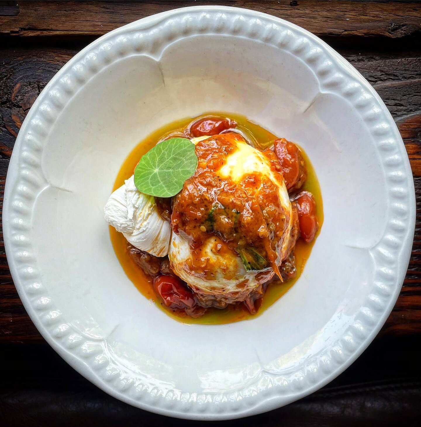 handmade burrata, spiced heirloom tomato compote, basil oil