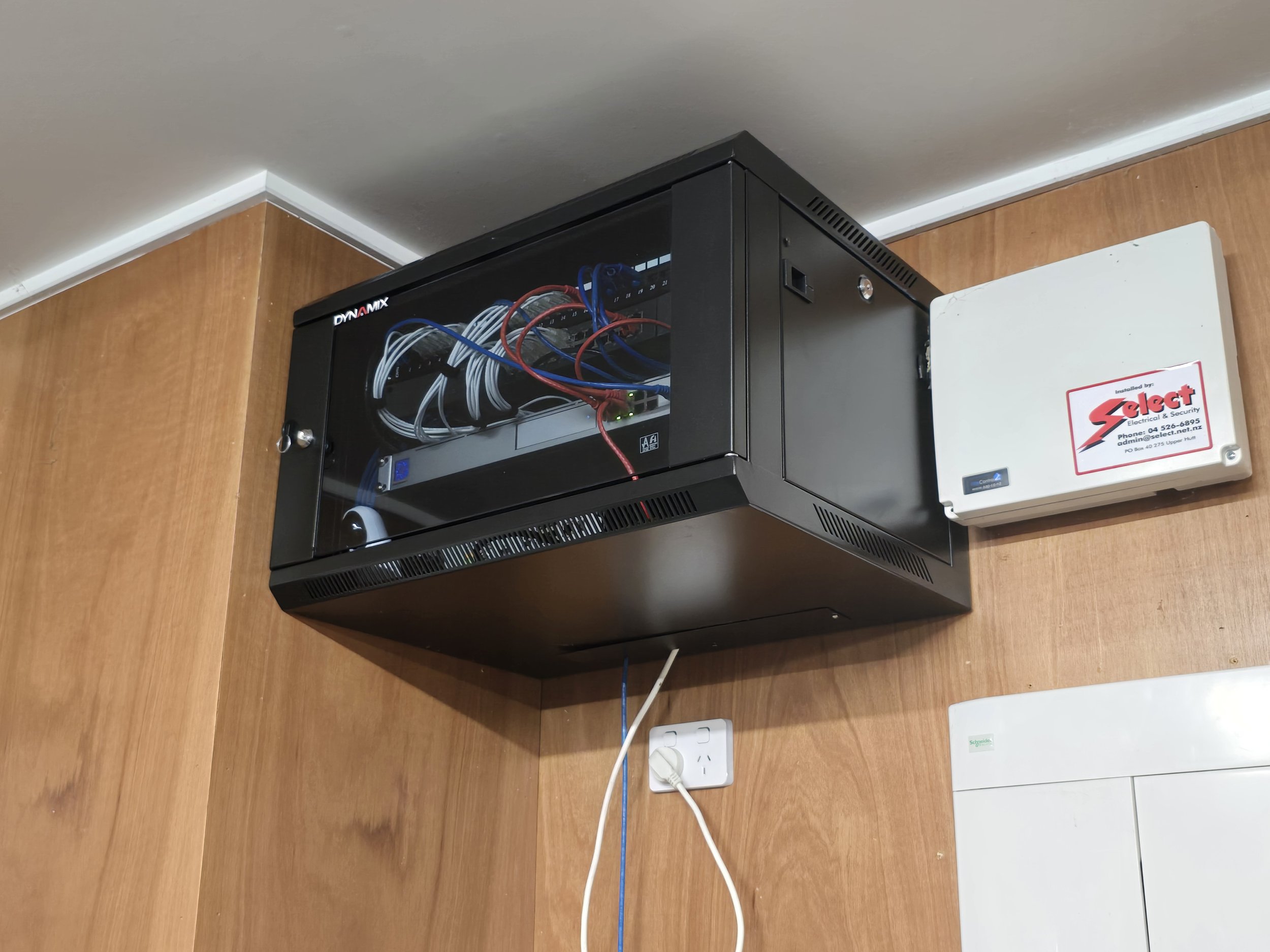 Wall-mounted server rack cabinet with network cables