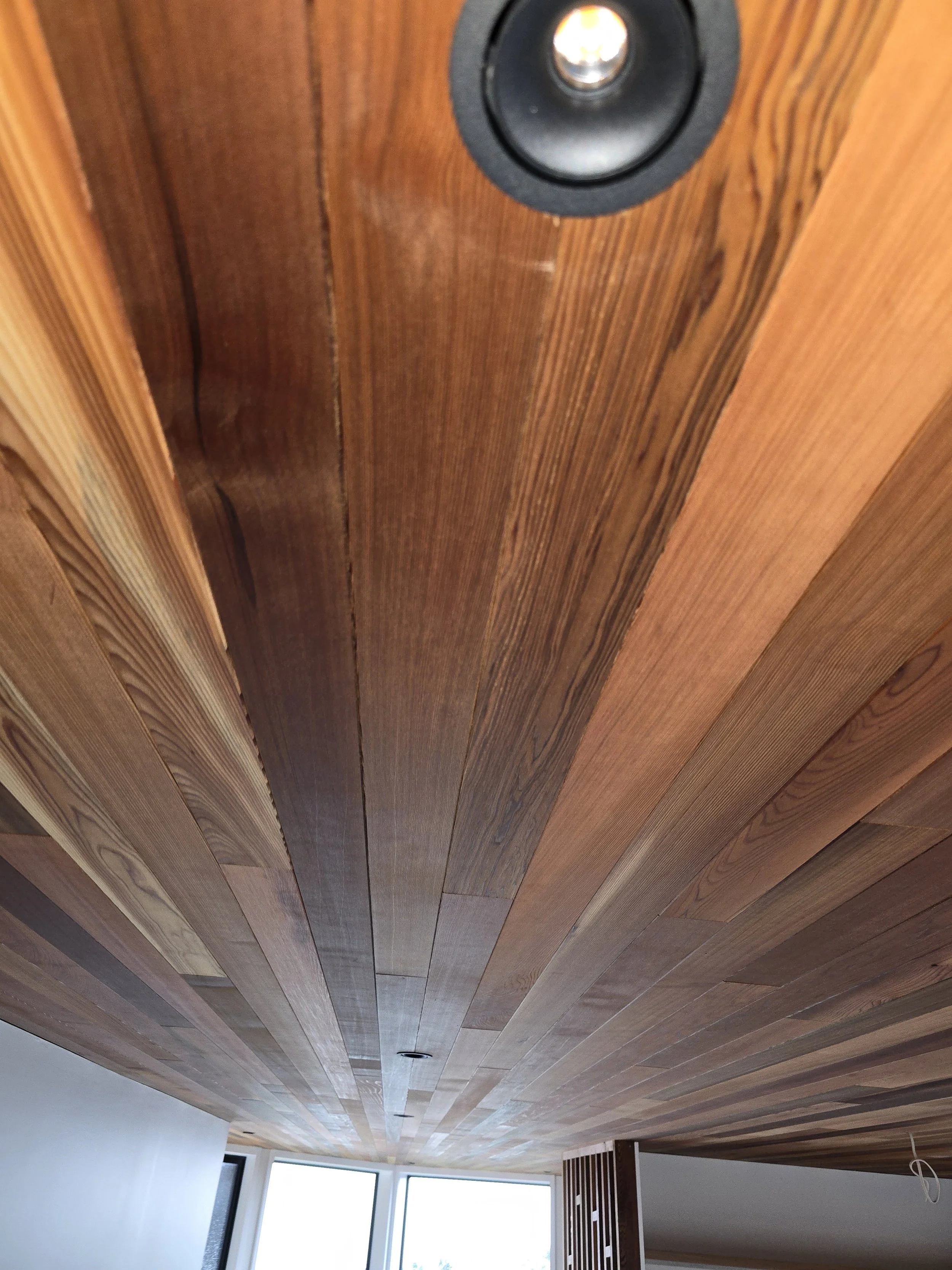Wooden ceiling with recessed light