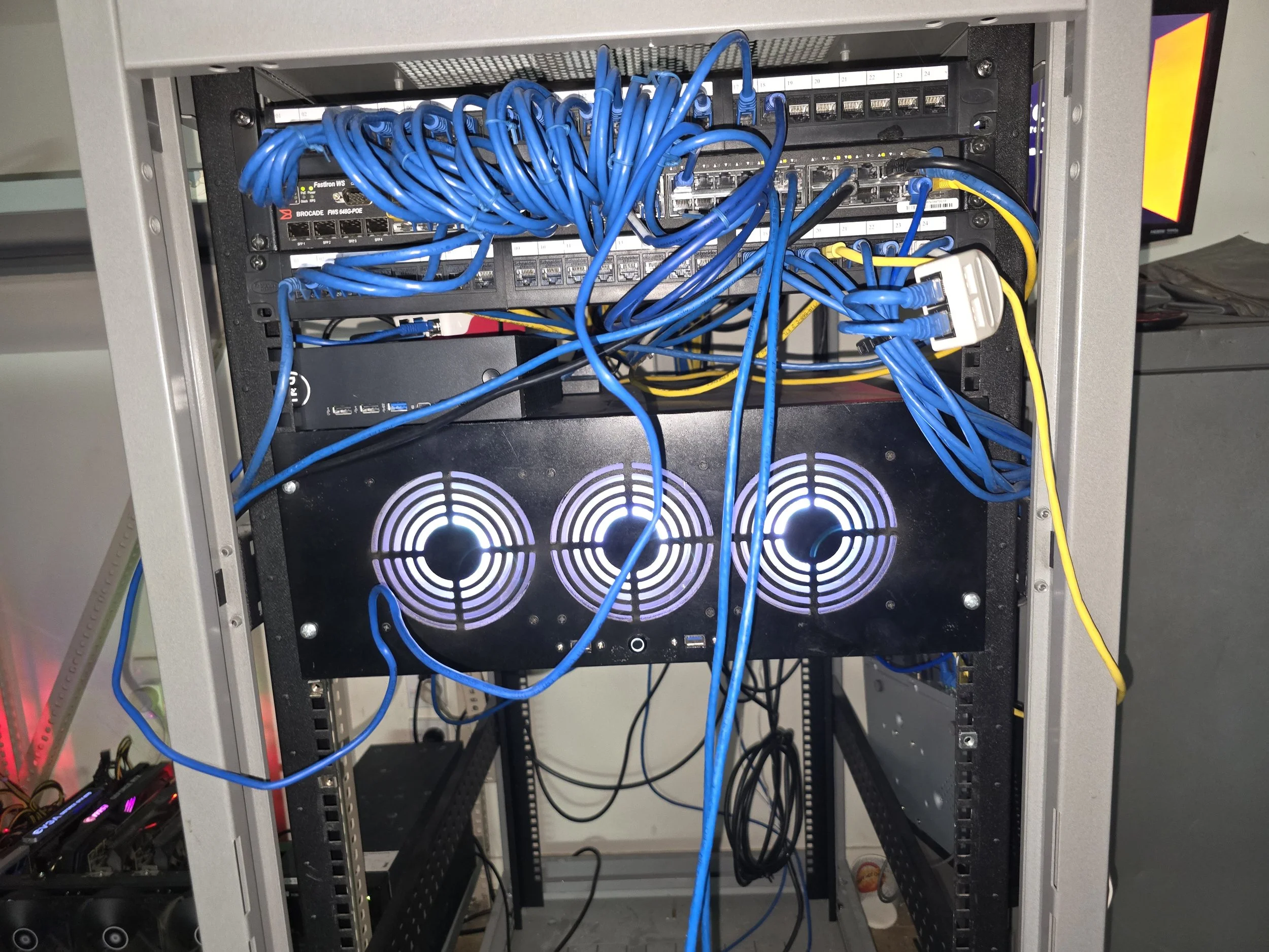 A server rack with networking equipment and cables