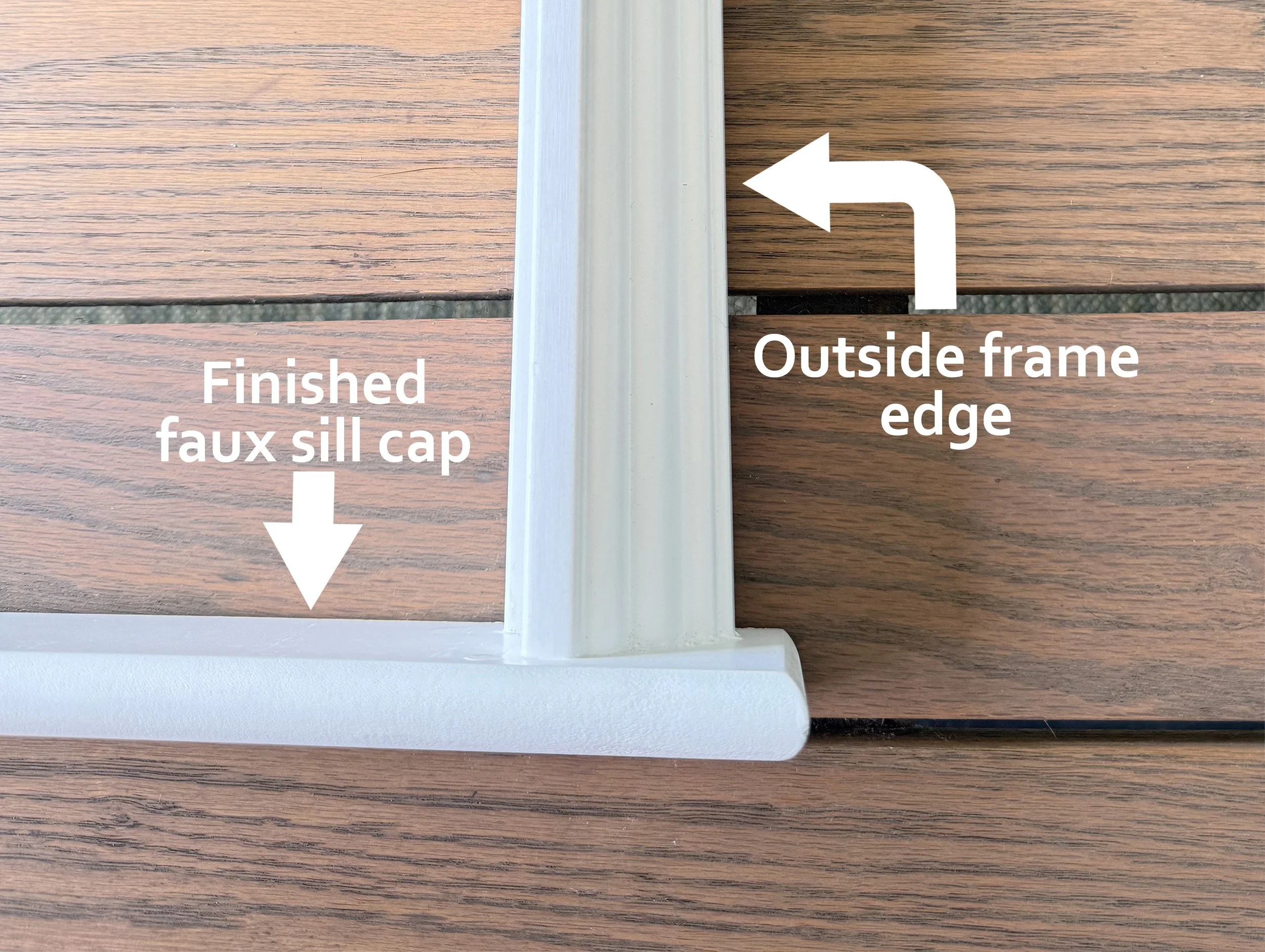 White ornate, decorative outside-mount plantation shutter frame