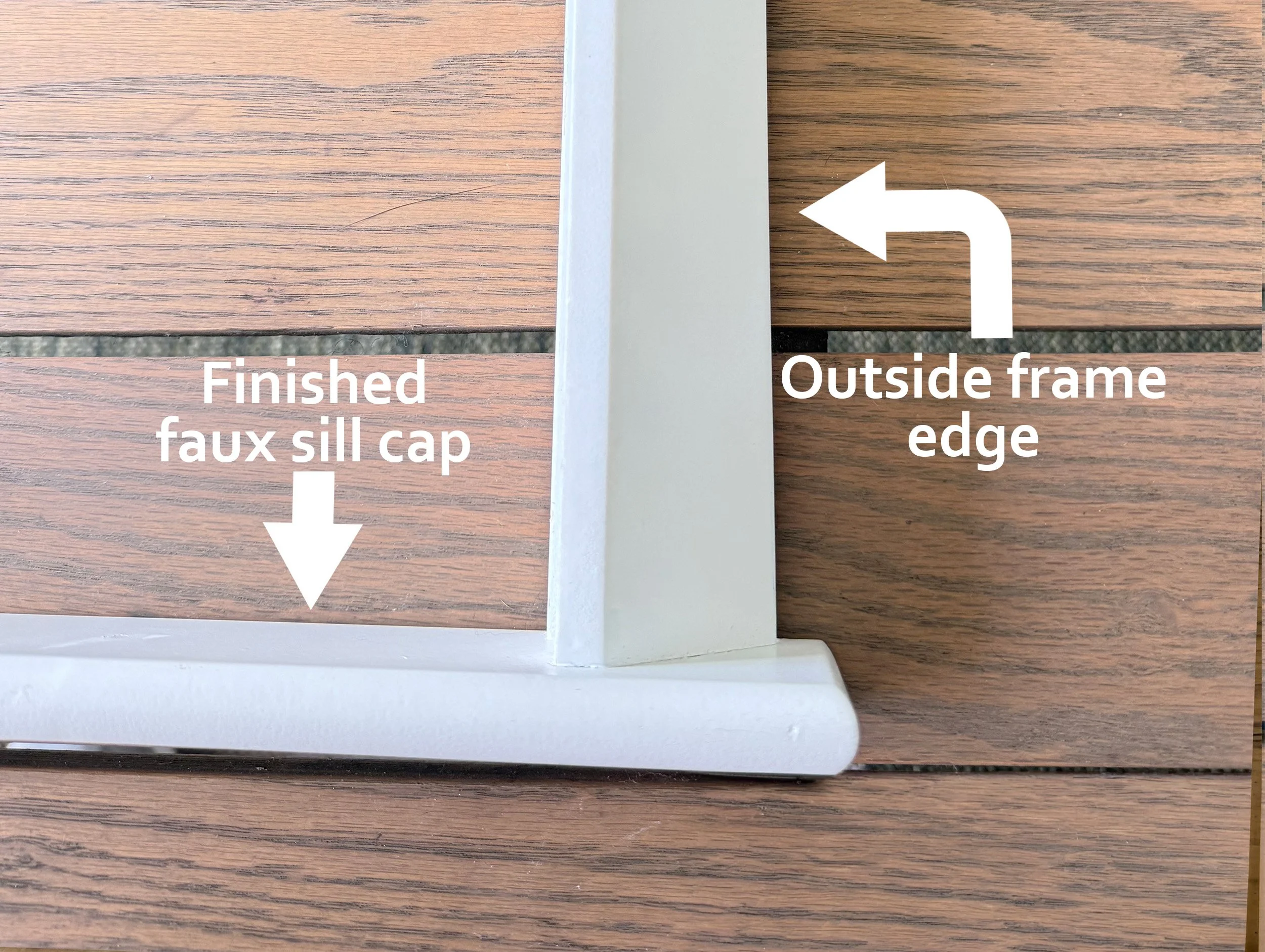 White flat, outside-mount plantation shutter frame