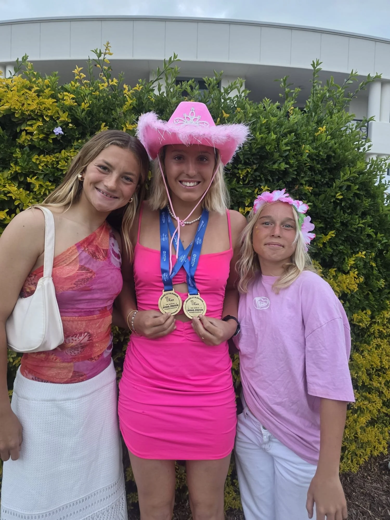 Celebration_Leihani-two-gold-medals-with-friends.jpg