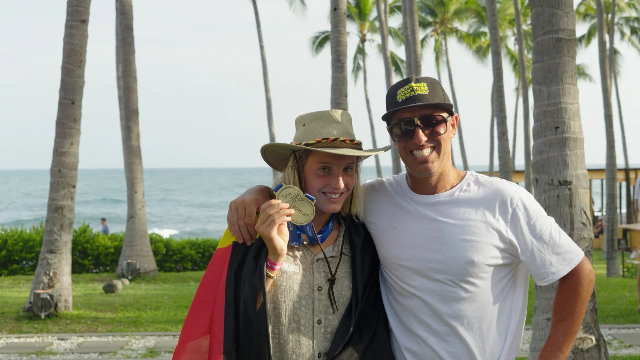 Leihani-With-dad-Clay-medal.jpg