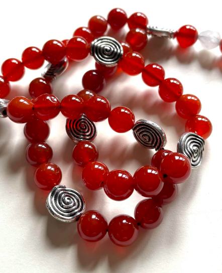 sheelanagigprayerbeads.png