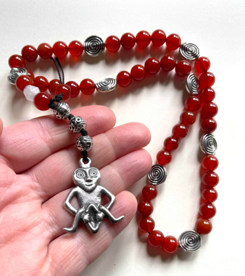 sheelanagigprayerbeads.png