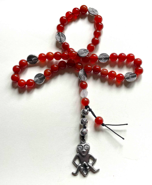 sheelanagigprayerbeads.png