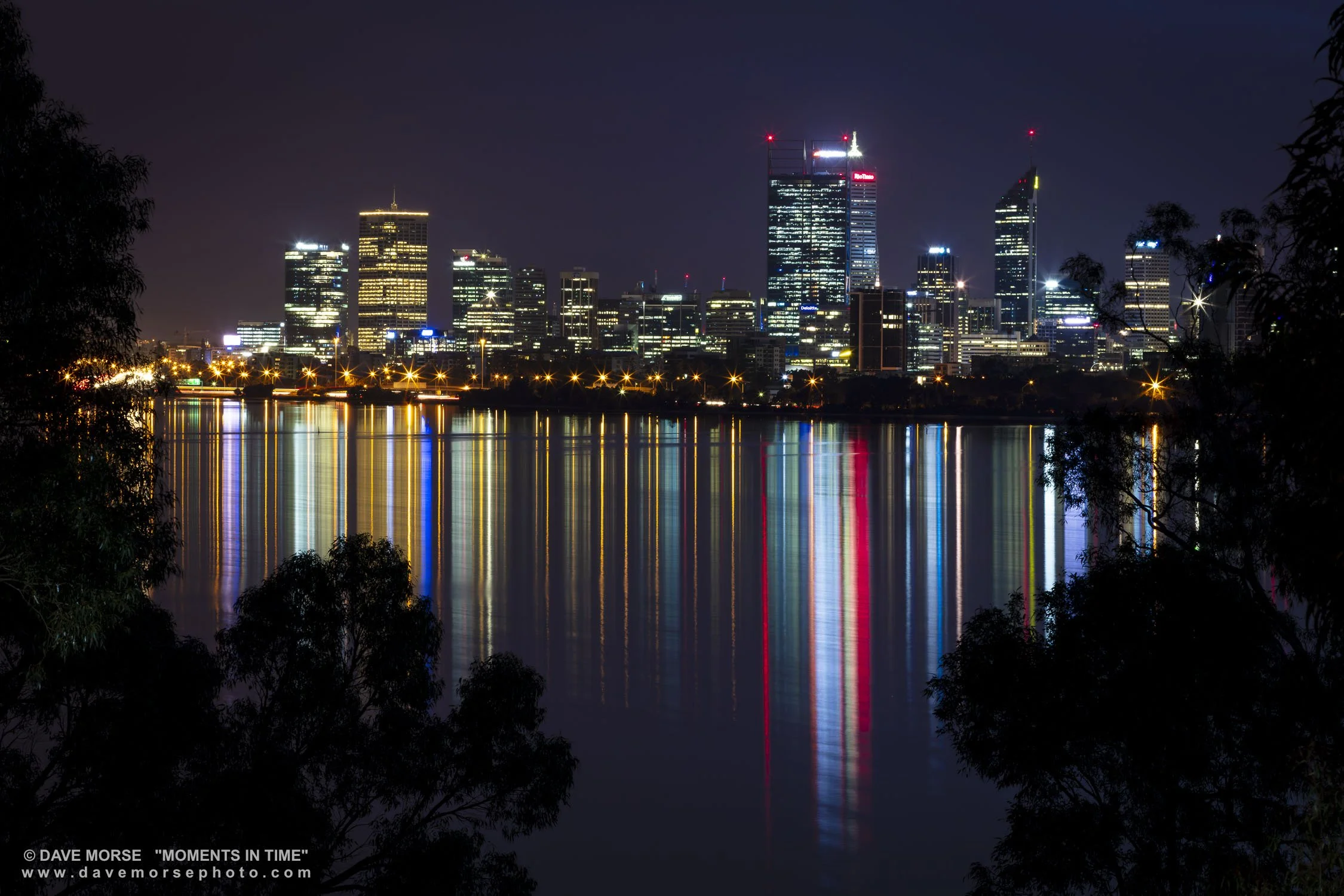 Applecross. Image No. A7612.13418.32 ... Perth City lights, looking through the trees at Pt. Heathcote. 6/8/2018.