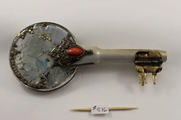 Busted Glass: Key 976