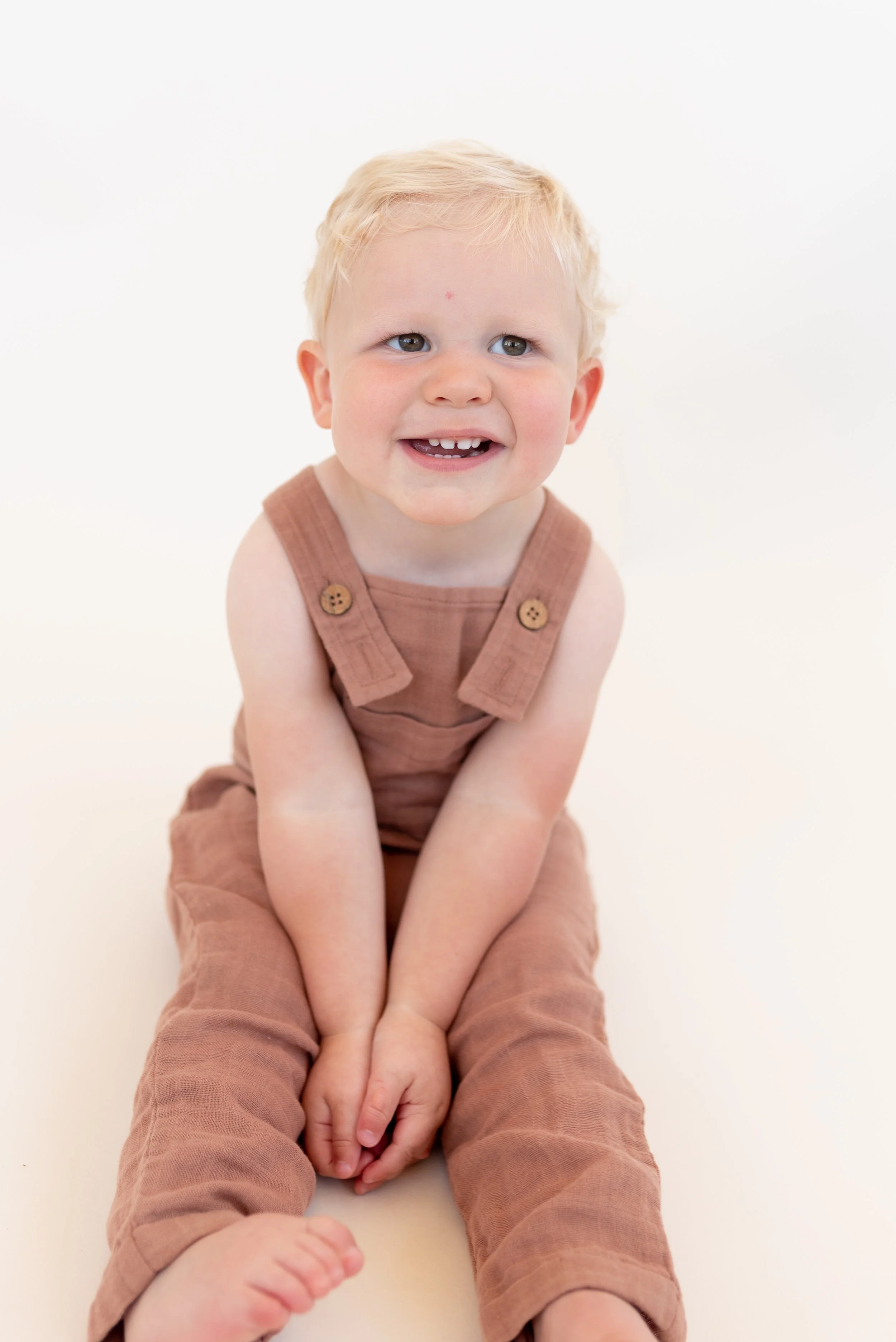 Milestone session of little boy taken in studio in Tacoma, WA