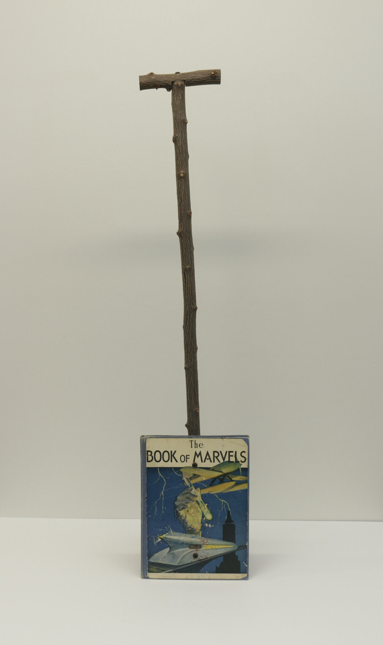 Steve Briscoe, Book of Marvels Oar, 2020, Book and wooden handle, 41 x 9 x 2"