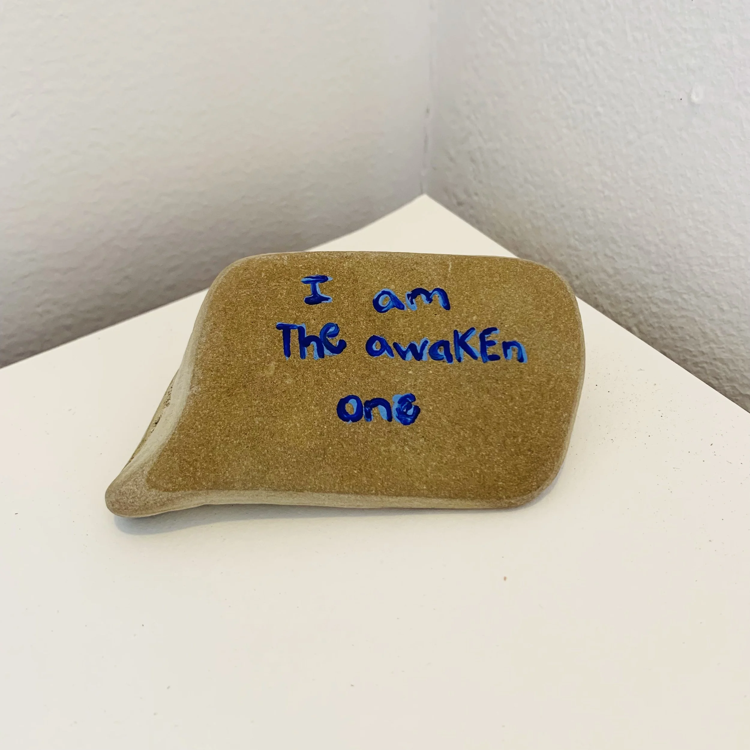  Kavanayén. I am. 2025  Local rock and gouache 3 × 3 in 7.6 × 7.6 cm 