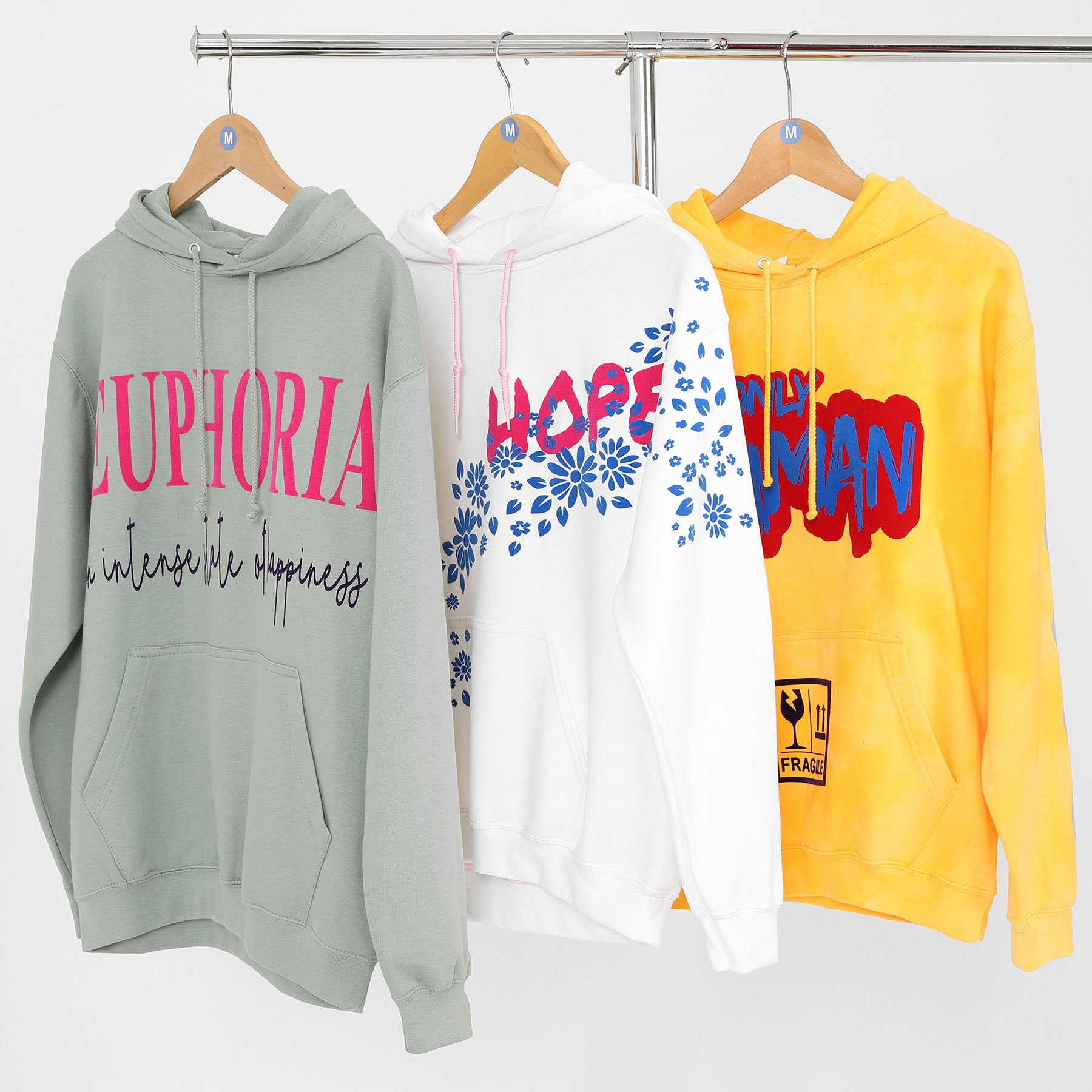 3  hoodies on a clothing rail showcasing our service 'Clothing Photography'