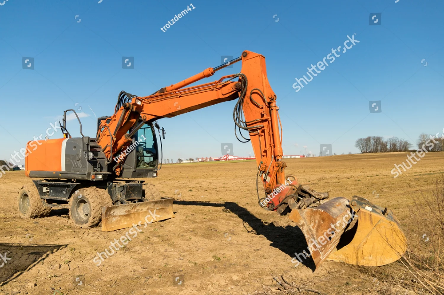 stock-photo-excavator-on-a-construction-site-1039643086.jpg