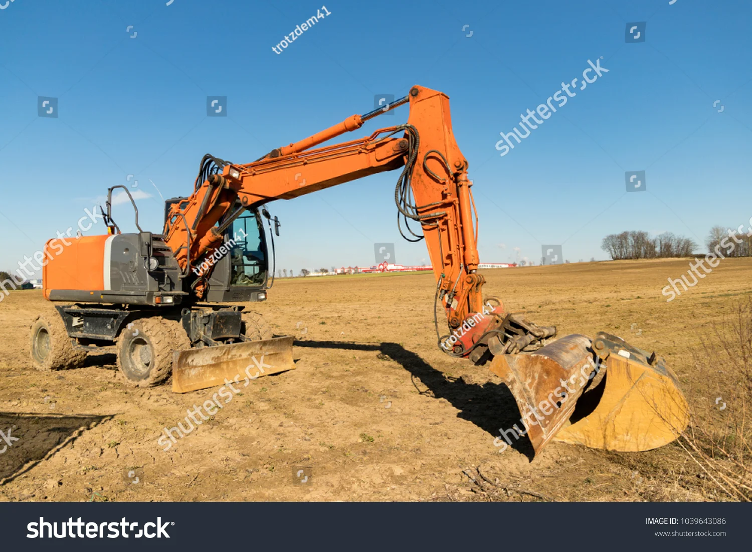 stock-photo-excavator-on-a-construction-site-1039643086.jpg