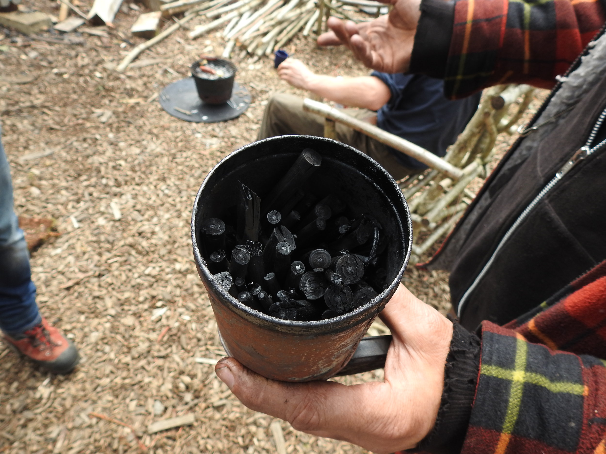 A pot of fresh willow charcoal from the Westonbirt kiln