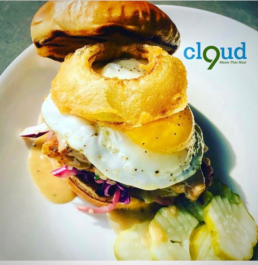 Chicken fried pork cutlet, mango-chile slaw, ez egg, tempura onion, THC infused giblet mornay sauce, on brioche. #cannabiscooking #cloud9meals #infuseddinners