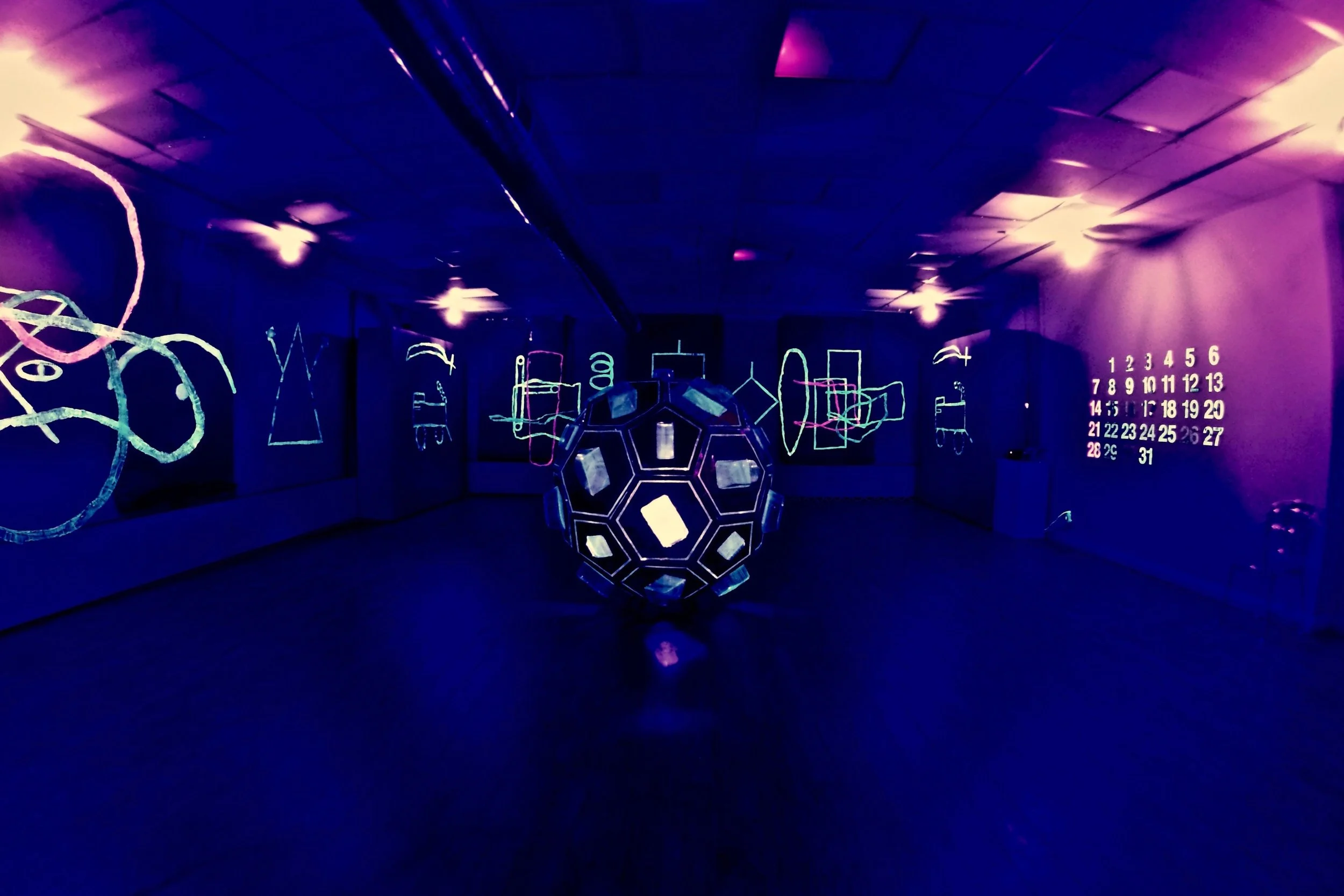 Dark Airing. ArtStart Rhinelander November 15 2018-January 12 2019. Conserved packaging, black light, original soundtrack by Nathan Tolzmann. Photo: Nate Sheppard.