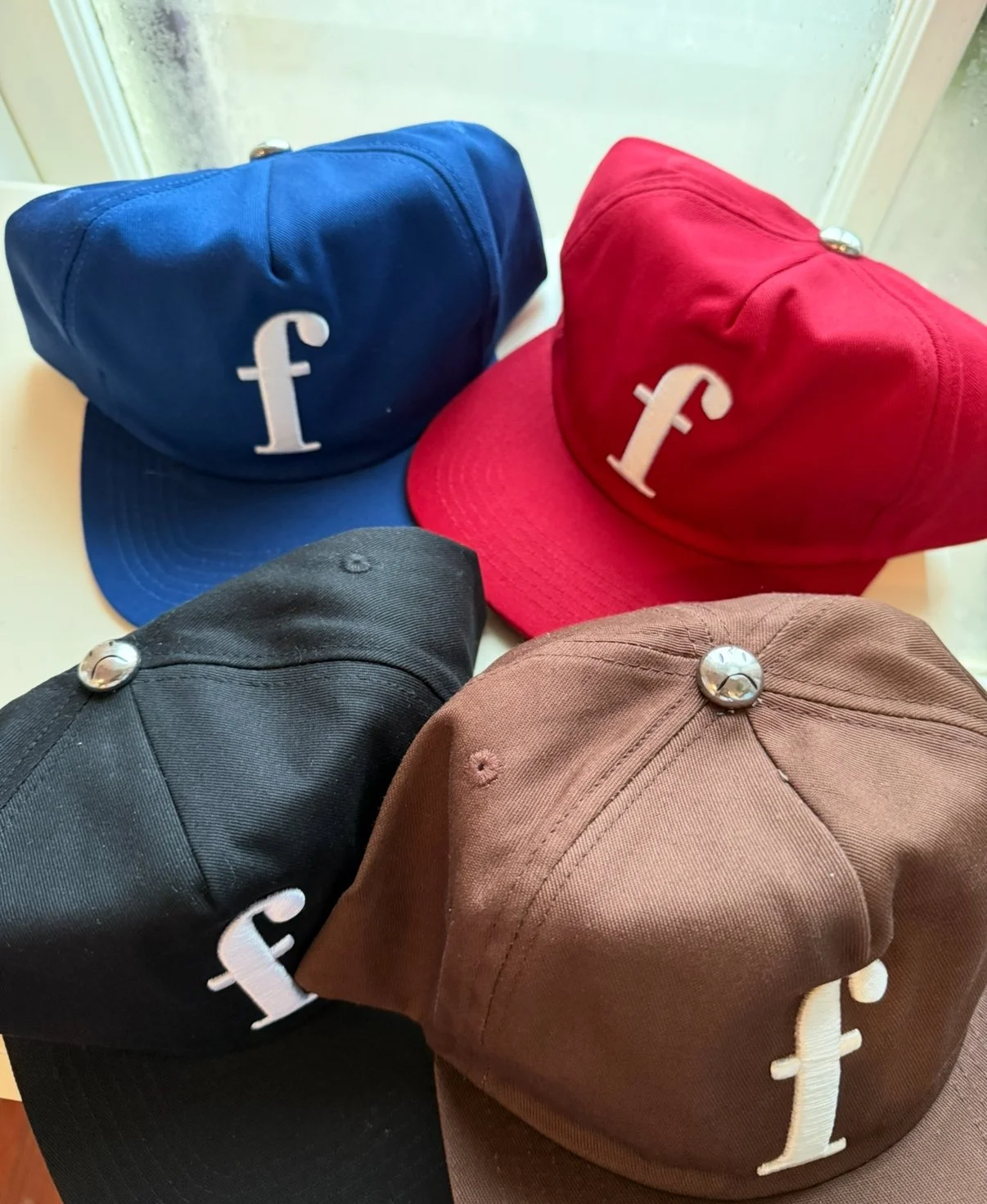 "f" unstructured Snap Backs
