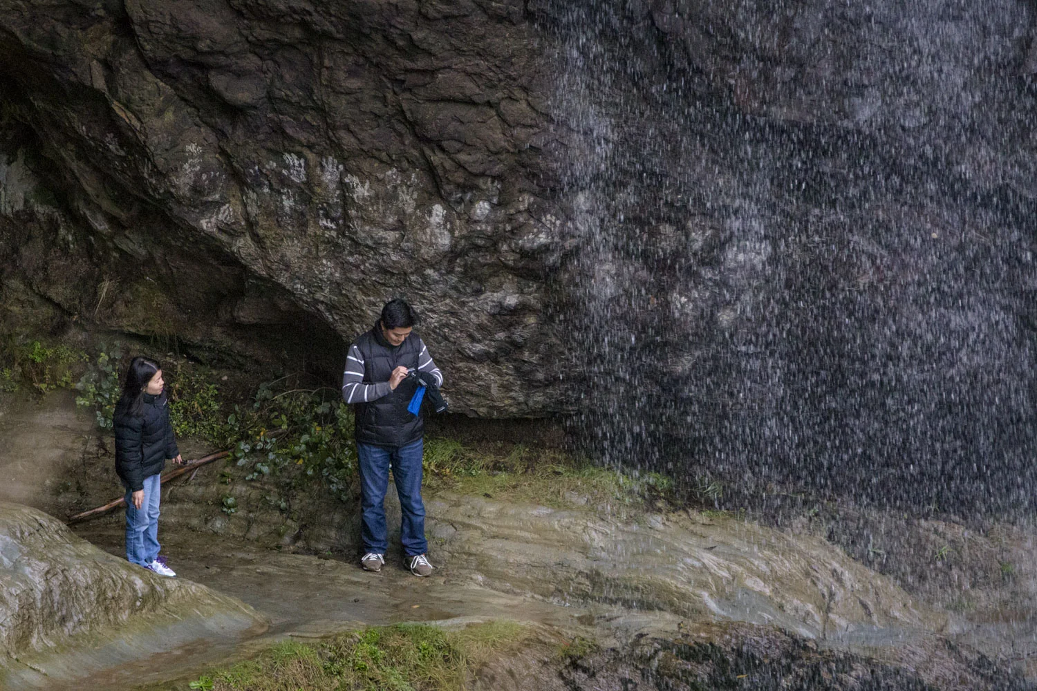 Underneath the falls is highly slippery and is a frequent spot for selfies.