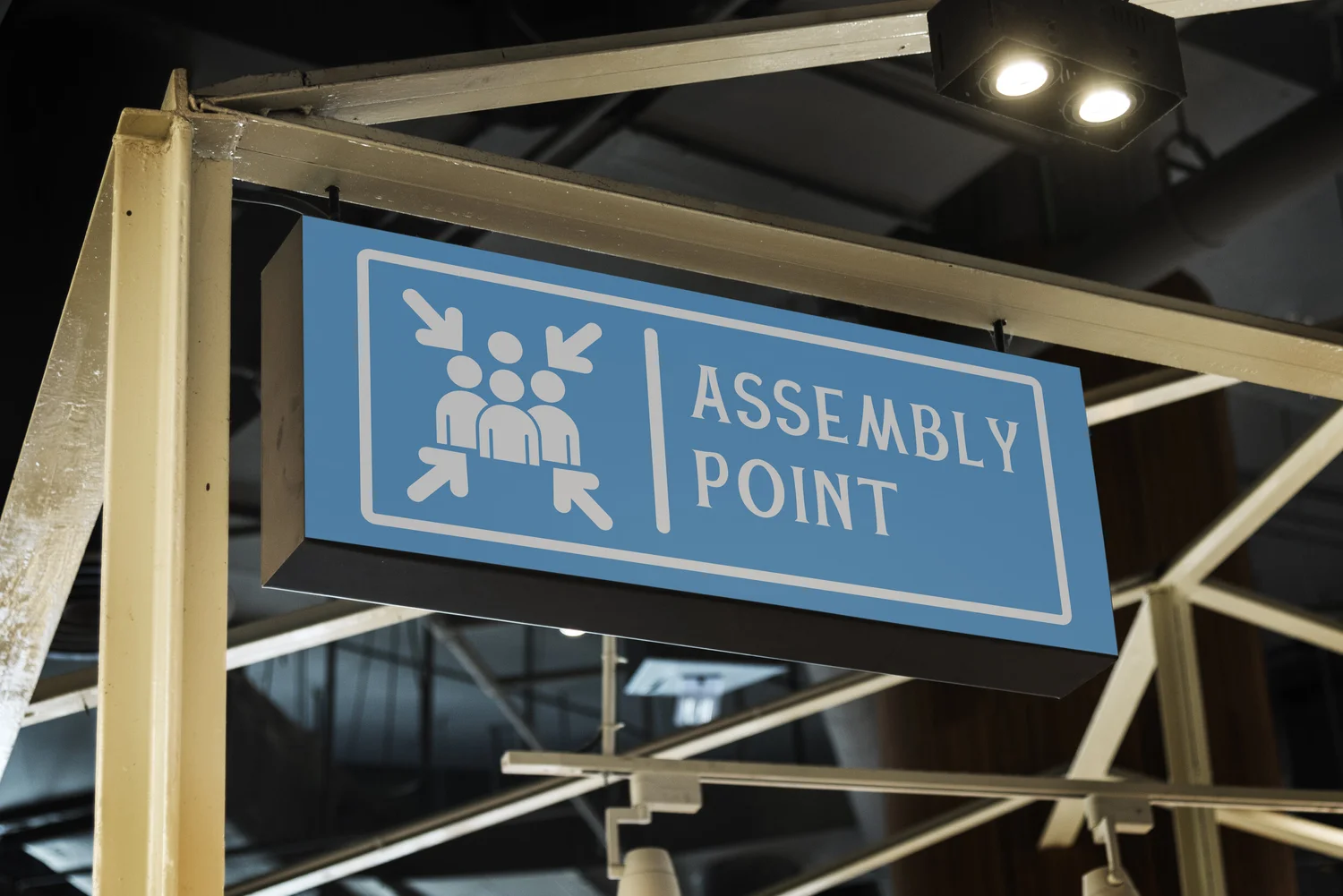Blue Assembly Point sign.