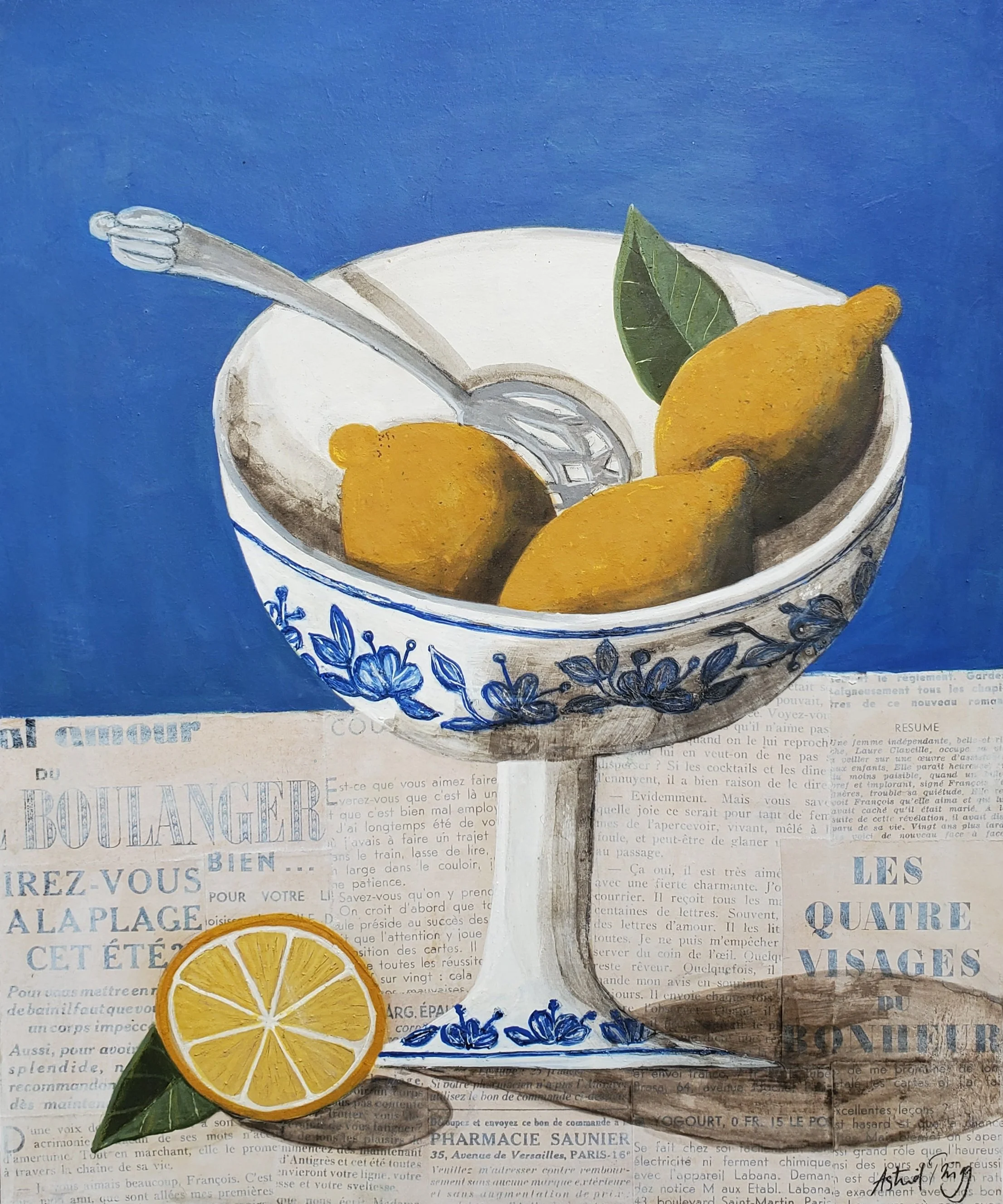 Still life with a bowl of lemons on a pedestal, a cut lemon, and a spoon against a blue background. Mixed media painting on panel by Astrid Trügg.