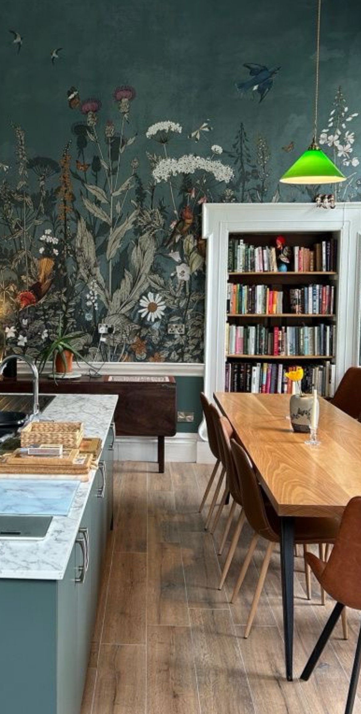The interior of the Dining Room in Coopershill House in Sligo, Ireland where artist Tracy Sweeney and Writer Marion Garvey will host a creative retreat in October 2026. The image shows a large wooden table, decorative green wallpaper