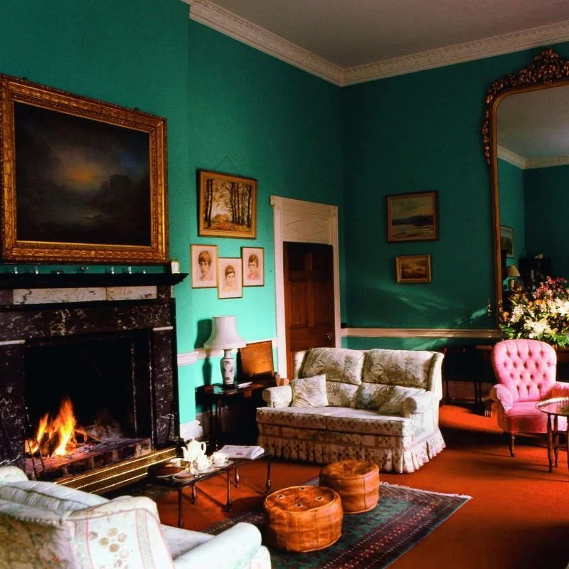 A welcoming open fire and hearth at Coopershill House, Sligo, where in 2026 a creative artist and writers retreat will be held.