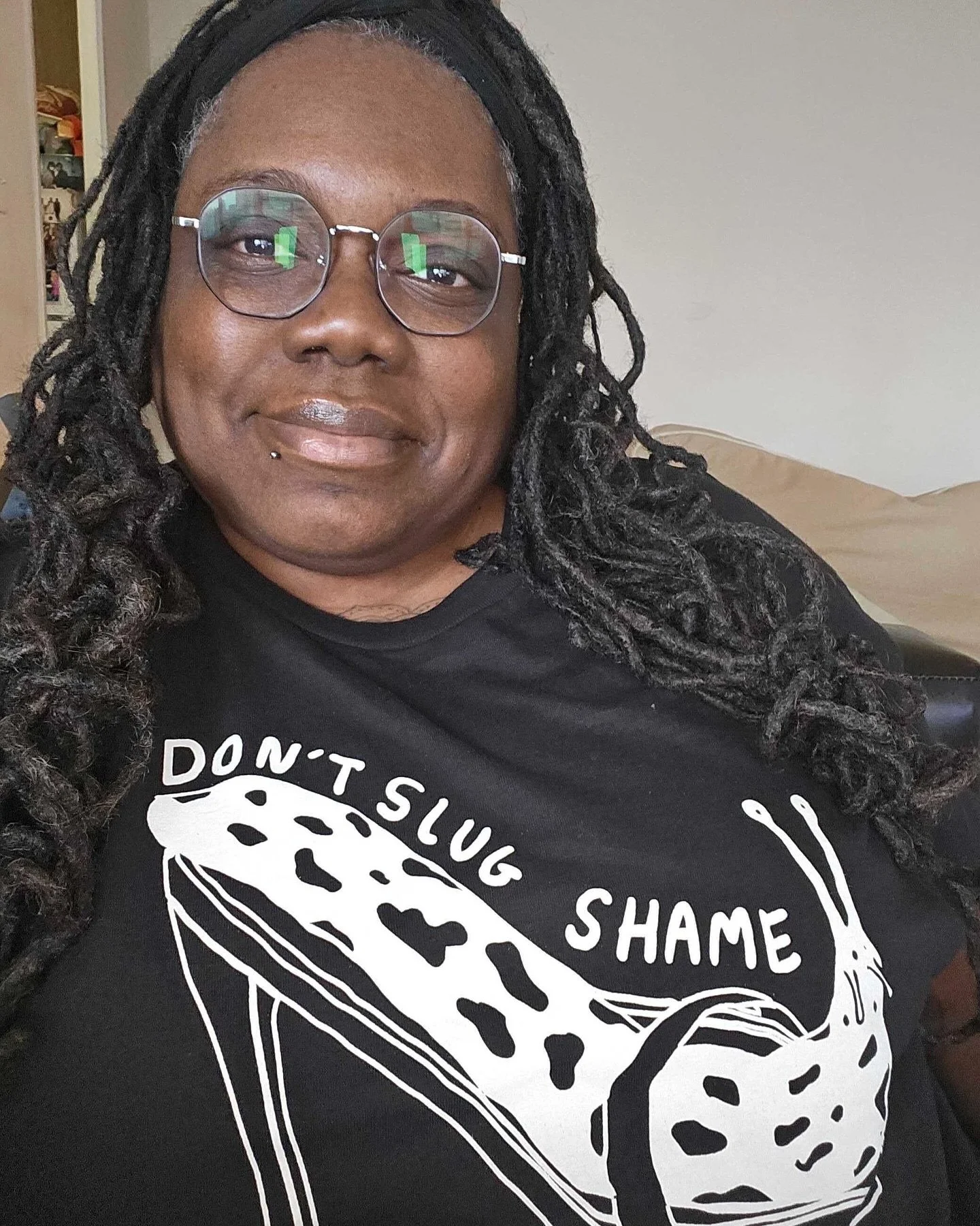 Our pal @lonyatewis and her slug named Sloane. Our Don&rsquo;t Slug Shame is available online in our store! Join us in looking slug-tastic!