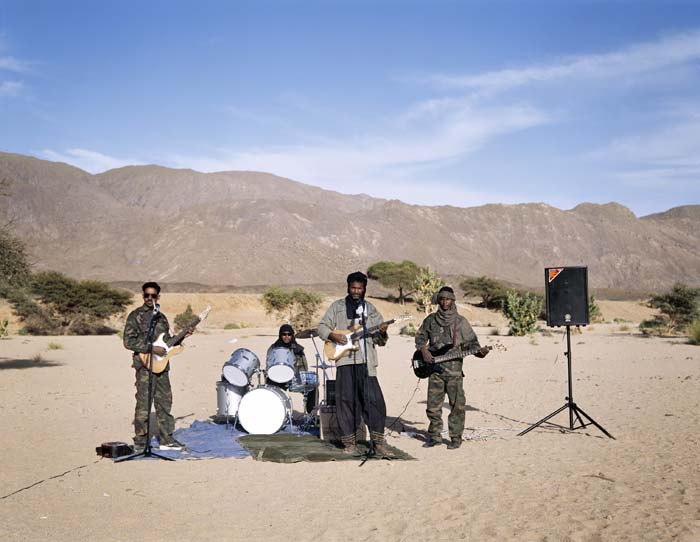 (L-R) Bibi, Al Hussein, Mohamed and Akli, are part of a Touareg Rebels rock band, settled by the MNJ in order to spread their message all over the Sahel Region. In the 90’s already, as the first rebellion took place, such a group was created and became famous up to Europe. Northern Niger, 2008 © Philippe Dudouit