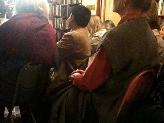 © Hind Mezaina - Inside Shakespeare and Company in the reading room, during the poetry reading session.