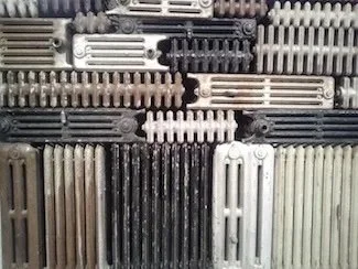 Bharti Kher, The hot winds that blow from the West, 2011 (131 old radiators, 195 x 264 x 254 cm)