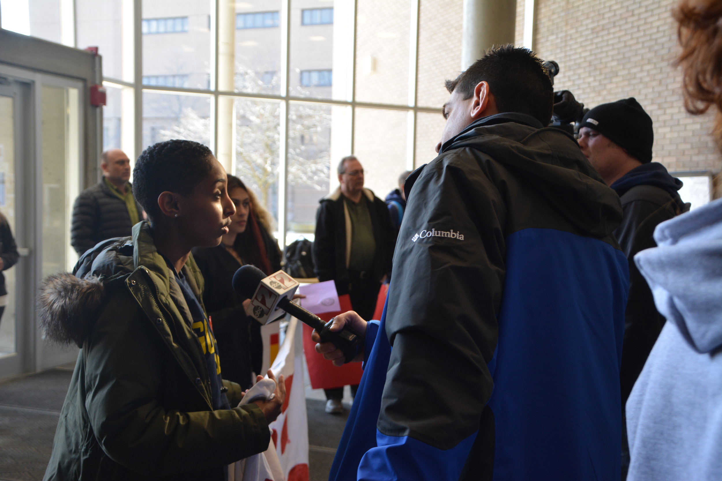  A UM Flint student ally speaks to the press about LEO contract negotiations in 2018 
