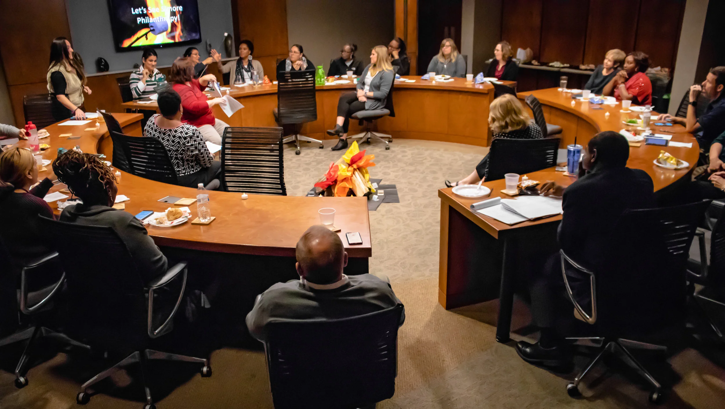 Staff gather around the “campfire” for the CMA Foundation’s annual Staff Campaign kickoff