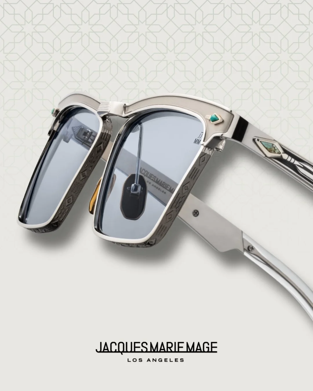 MILES CITY in Silver by Jacques Marie Mage

Square, &lsquo;50s-inspired titanium spectacles with finely engraved lens-rims and recessed brow, featuring our signature arrowhead front pins embellished with epoxy or precious stone inlays. Matching inlay