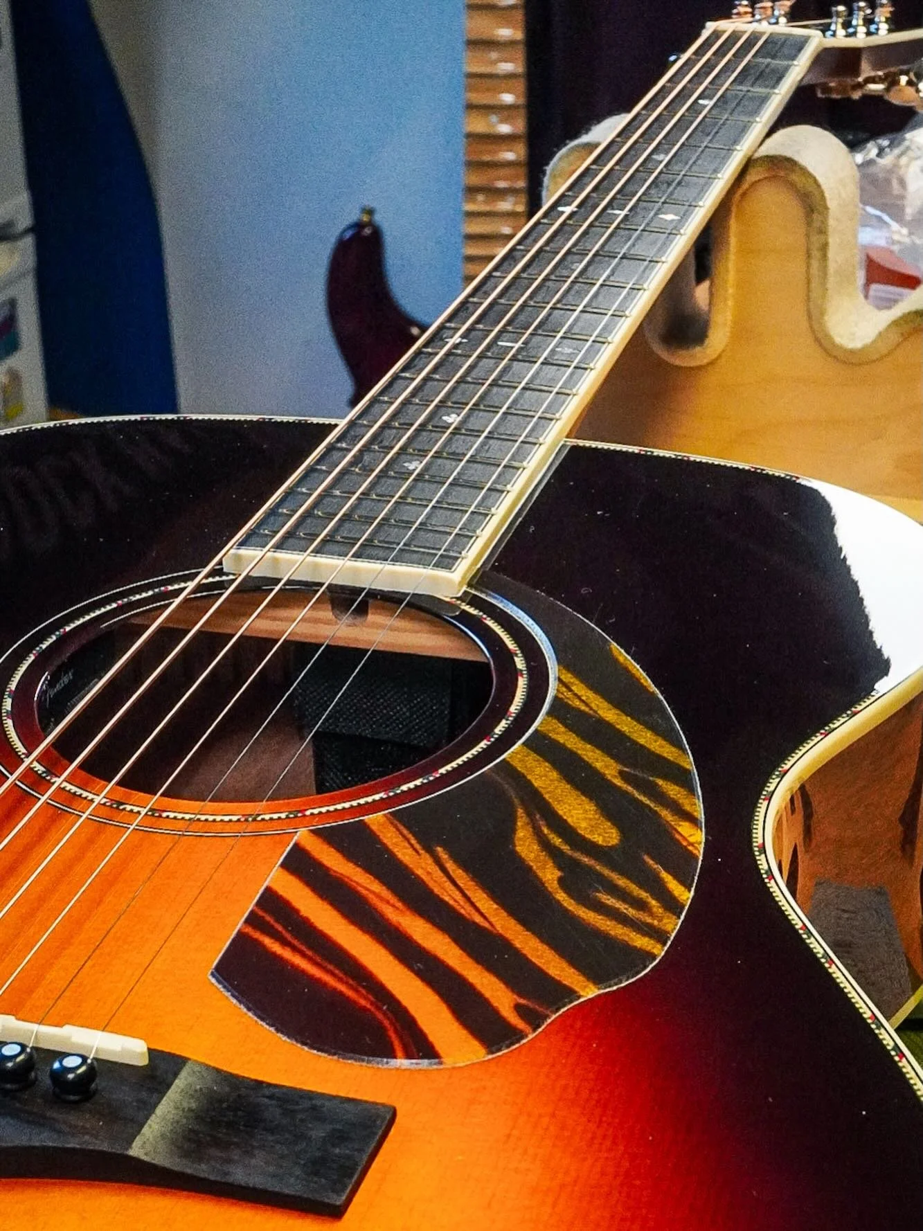 A busy day in the workshop today getting through a few guitars. This very pretty Fender Paramount acoustic was in the bench for a setup and to sort out a few pesky fret ends too. Plays as good as it looks now! #fender #fenderparamount #whatsonyourben