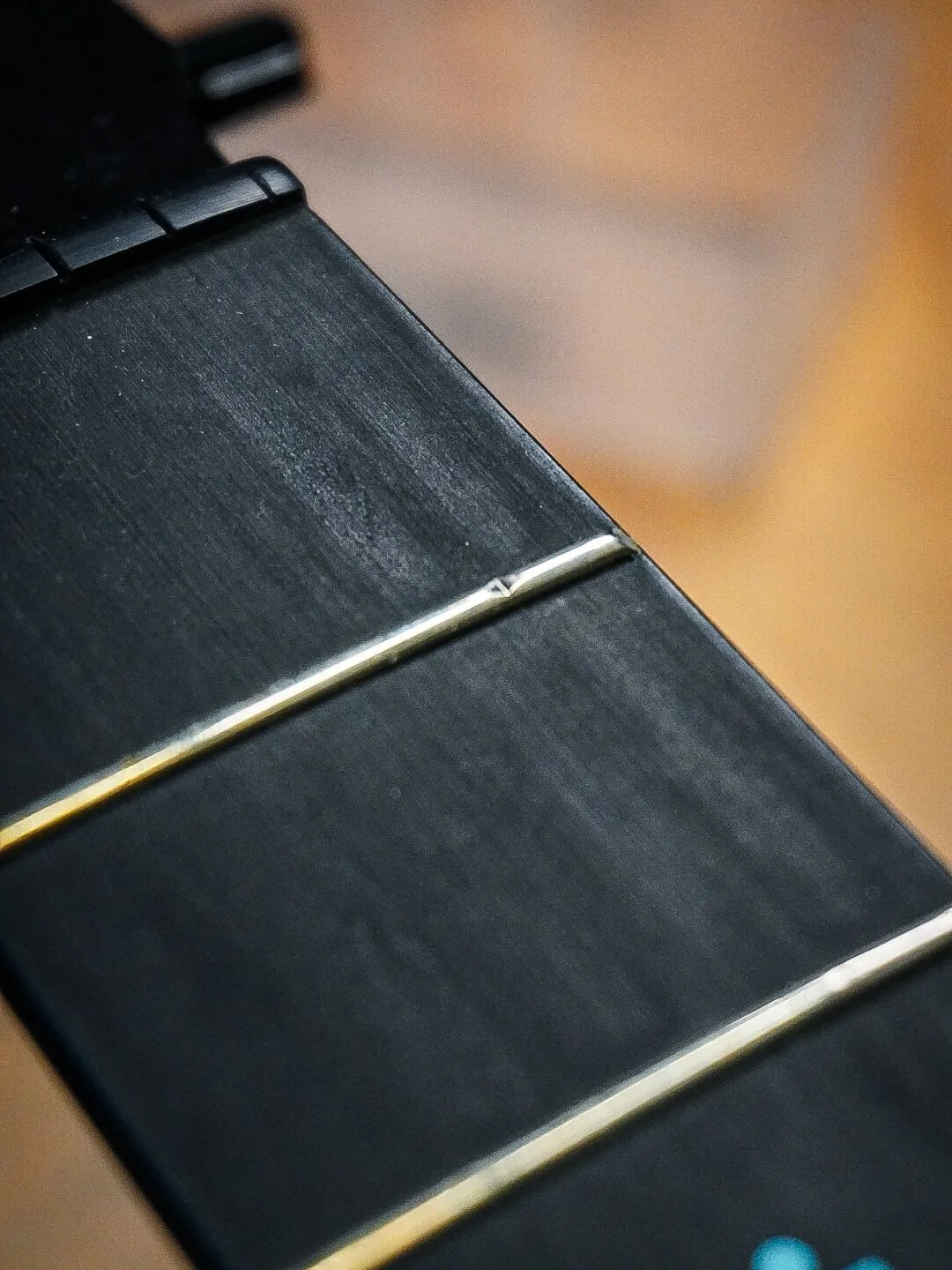 This Martin Ed Sheeran signature guitar hand a huge dink in its first fret. It was right next to the B string and hasn&rsquo;t from play wear.

So my customer asked me to see what I could do. 
A full refret was a bit silly so I managed to find some p