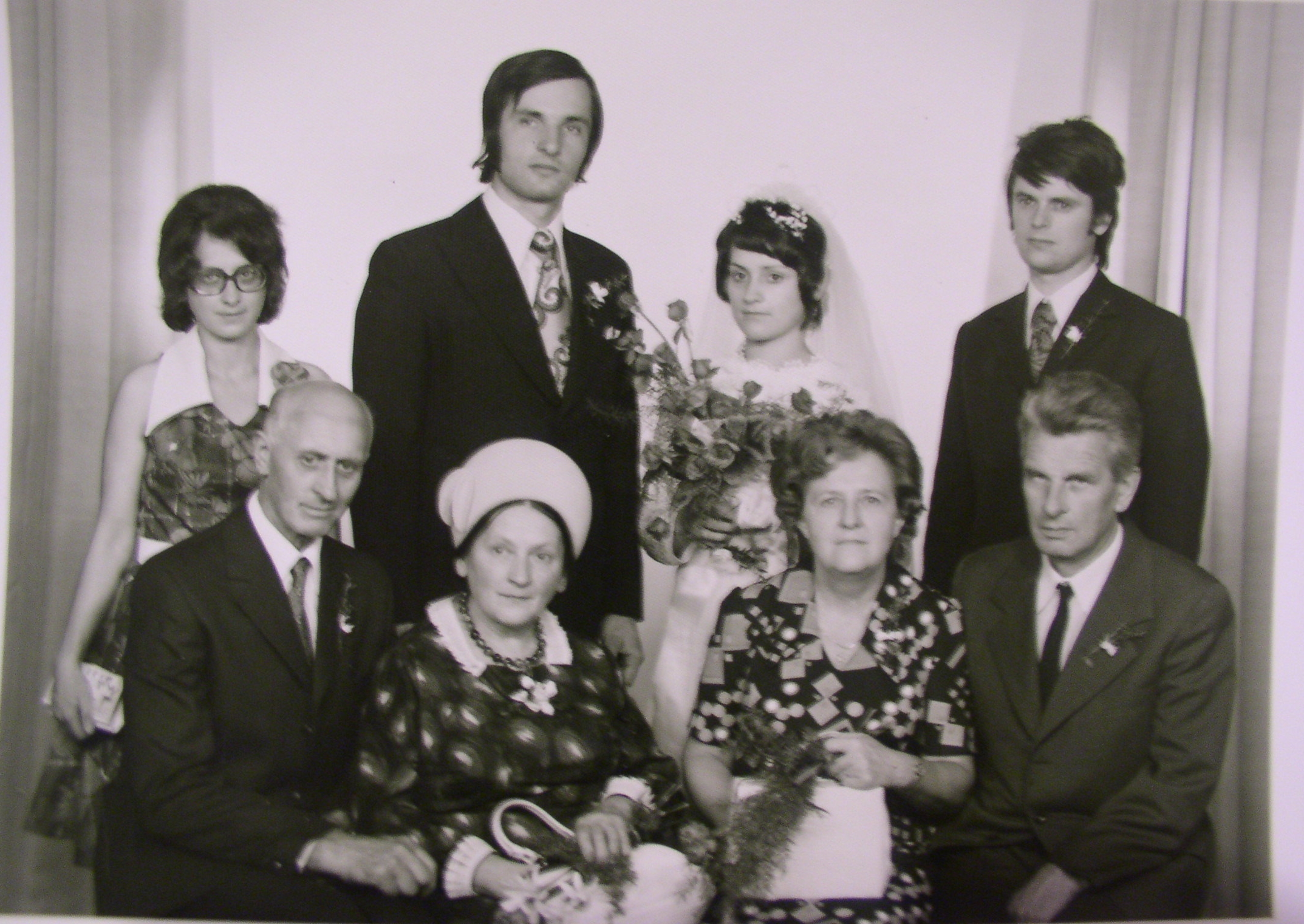 Author on her wedding day, with her mother second from the left