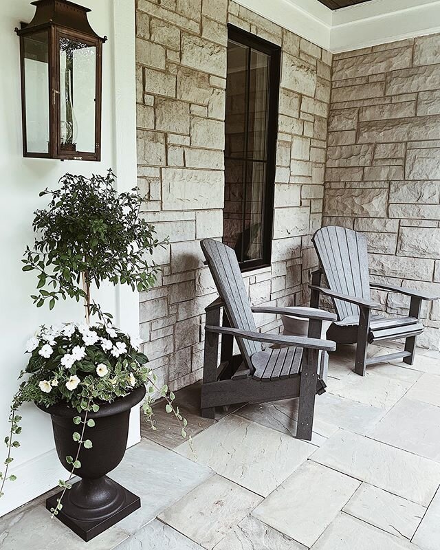 Favorite spot in my home. #frontporch #outdoordecor #adirondacks #adirondackchair #bluestone #bluestonepatio #recycledplastic #frenchquarter #copperlanterns #homesweethome #planters #planter #targetstyle #targetfinds #targetdoesitagain