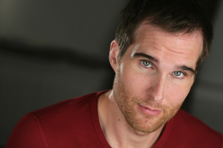 Raife Baker Headshot.jpg