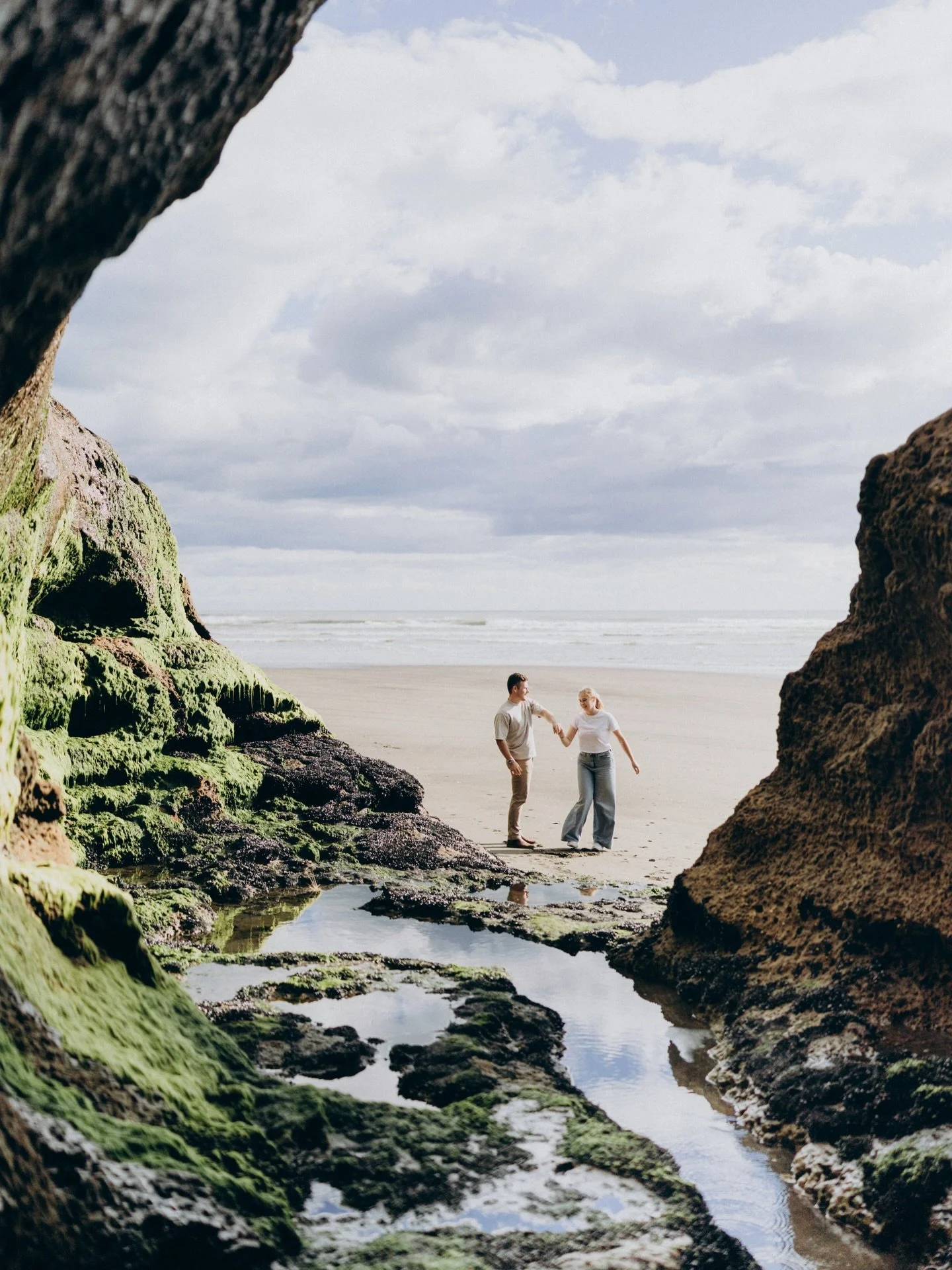 I love exploring new places, so when Abby and Nick told me they wanted their engagement session at Karioitahi Beach, I was already buzzing with excitement. And then they mentioned they wouldn&rsquo;t mind getting a little wet during the shoot&hellip;