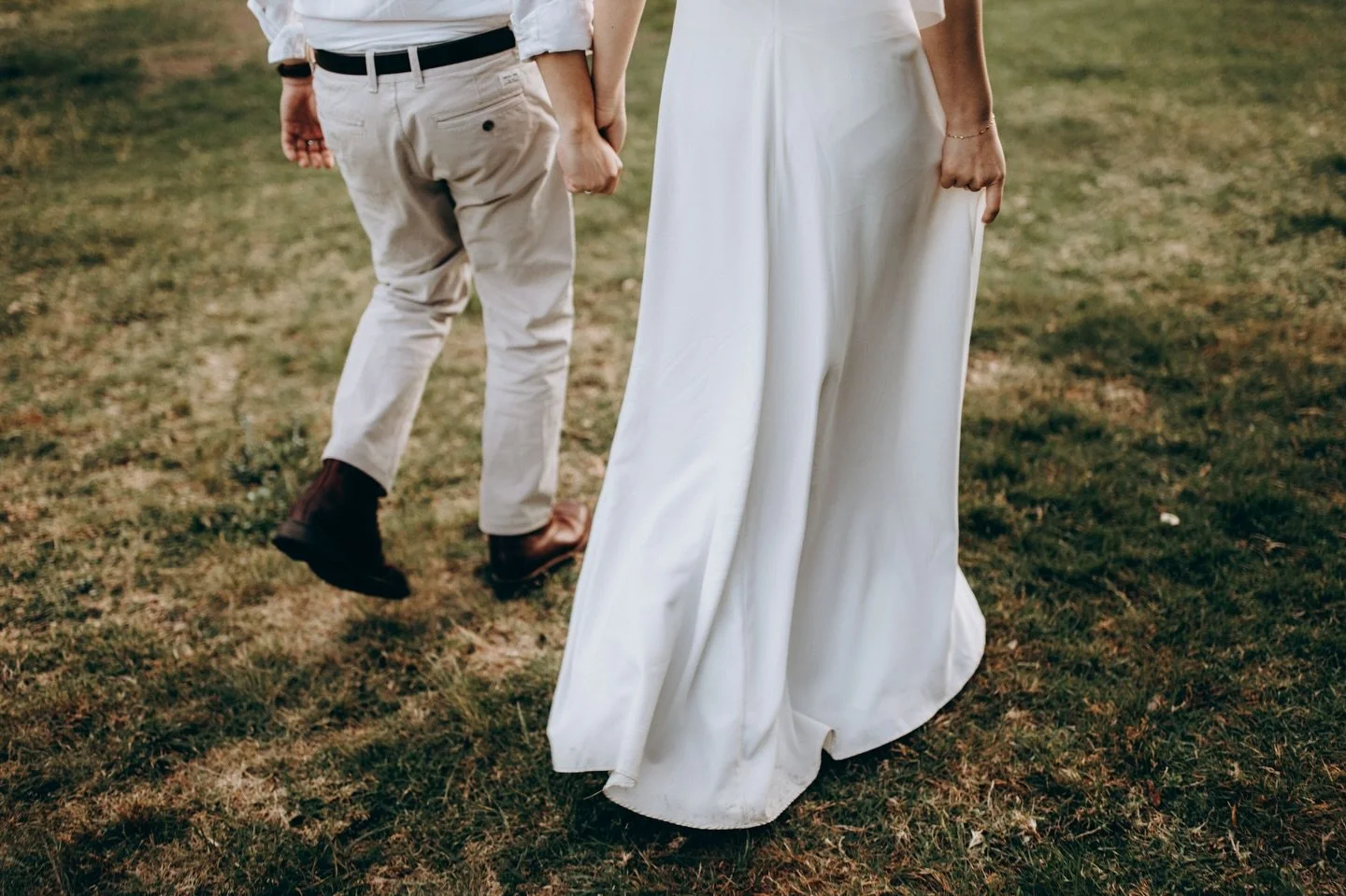 The prettiest light, a flowing dress, and two people who just can&rsquo;t stop holding hands. My kind of moment.