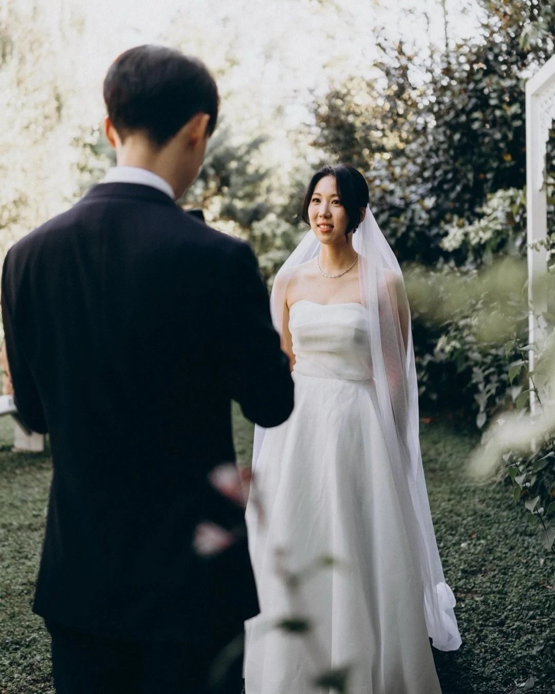 Leah &amp; Min 

Both from NZ, now living and working in Australia &mdash; but they came home to celebrate with their closest people. A small, intimate day with immediate family.

Before the ceremony, Leah&rsquo;s dad came over to say hi and introduc