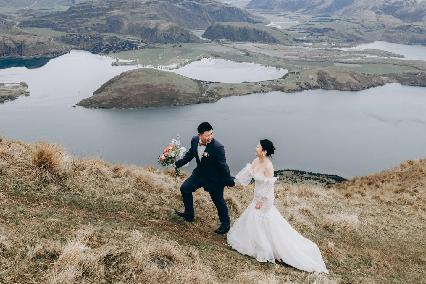 Flashback to my very first helicopter ride last September with Lulu &amp; Hao.
Cold wind, unreal views, and these two just being the happiest.
Still in love with these photos

Wedding planner: @ifusionweddingnz 
Helicopter: @wanakaheliweddings 🚁 
Ma