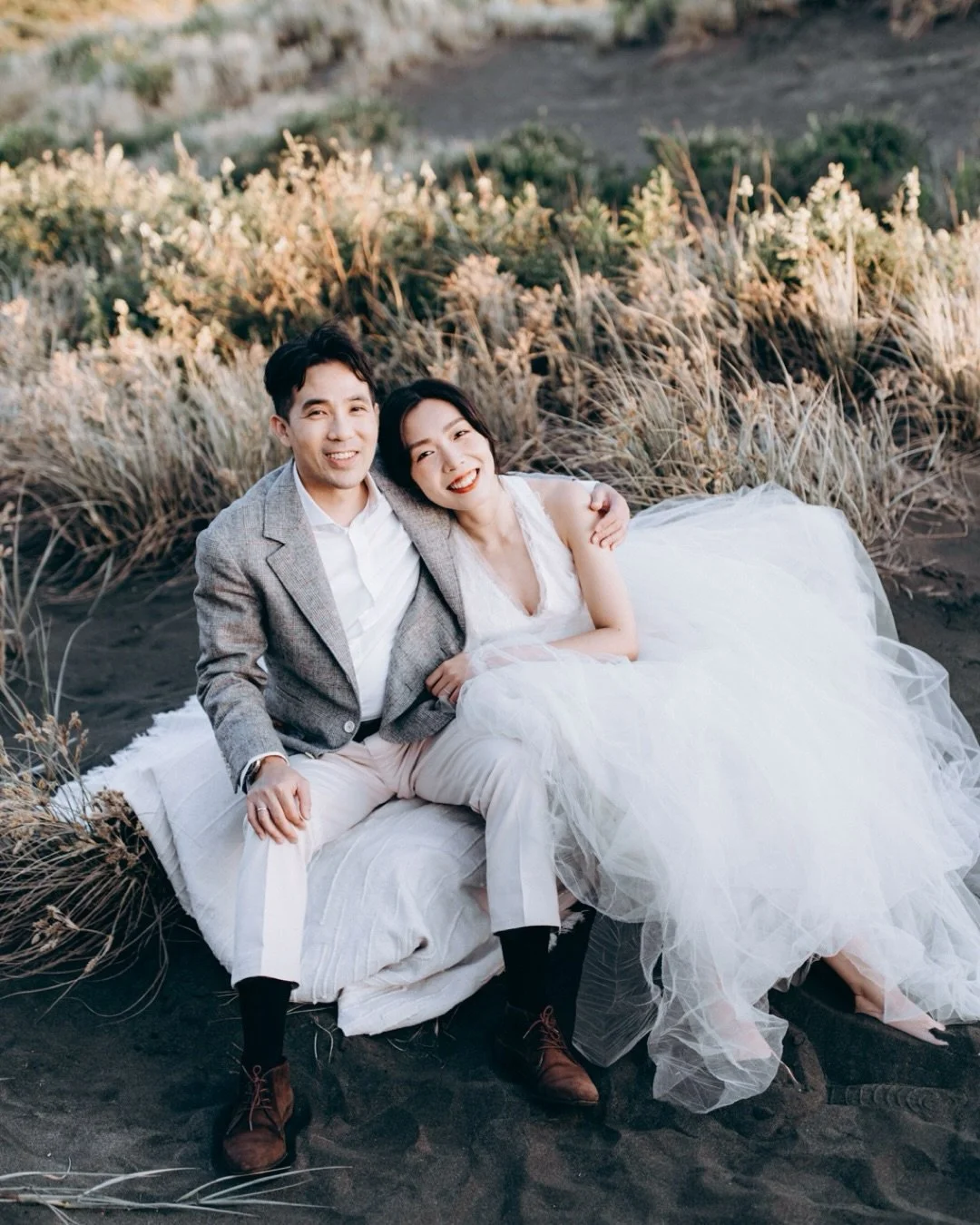 One of my favourite beaches to photograph in Auckland&mdash;Karekare Beach.

Waterfalls, black sand, rolling sand dunes, long white grass, and soft golden light. It has everything I love in one place.

Makeup artist and hairstylist: @yuyujinli_makeup