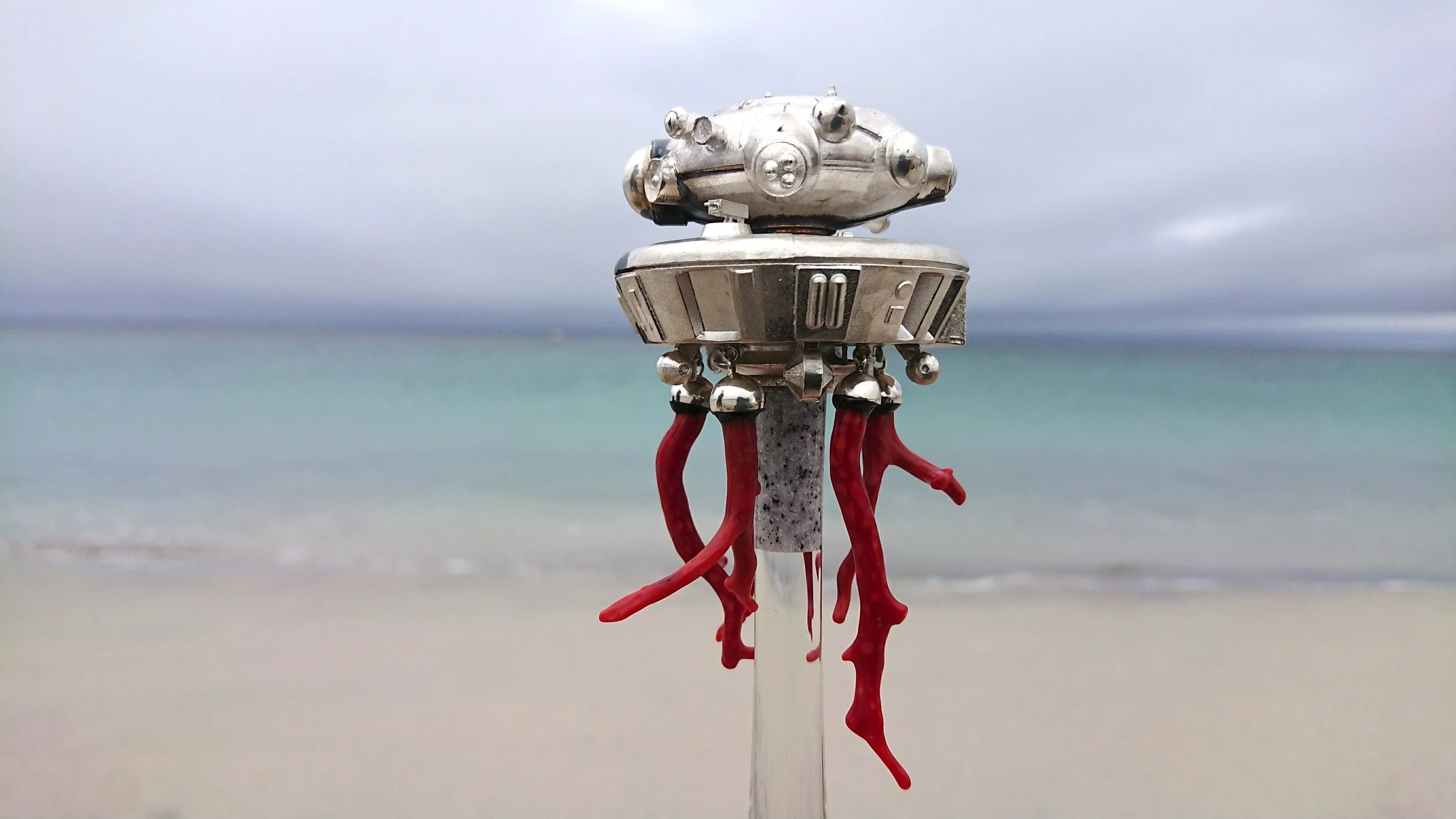     Amhrán a Gligín  is a song and sculptural artefact that accompanies  Manned-Unmanned,  produced for AERIAL / SPARKS by Louise Manifold in 2020  Kennedy Browne’s project stages encounters with real and speculative artefacts washed up on the island