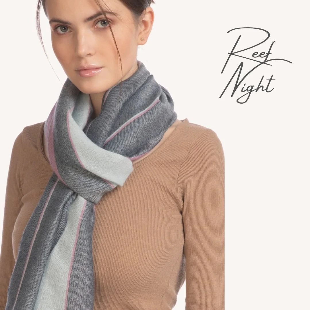 Reef Night

A modern take on classic luxury, the Reef Night Scarf is handwoven in pure cashmere and designed with a clean three-way linear color pattern in ice blue, grey, and pink. Lightweight yet warm, it&rsquo;s the perfect balance of softness and