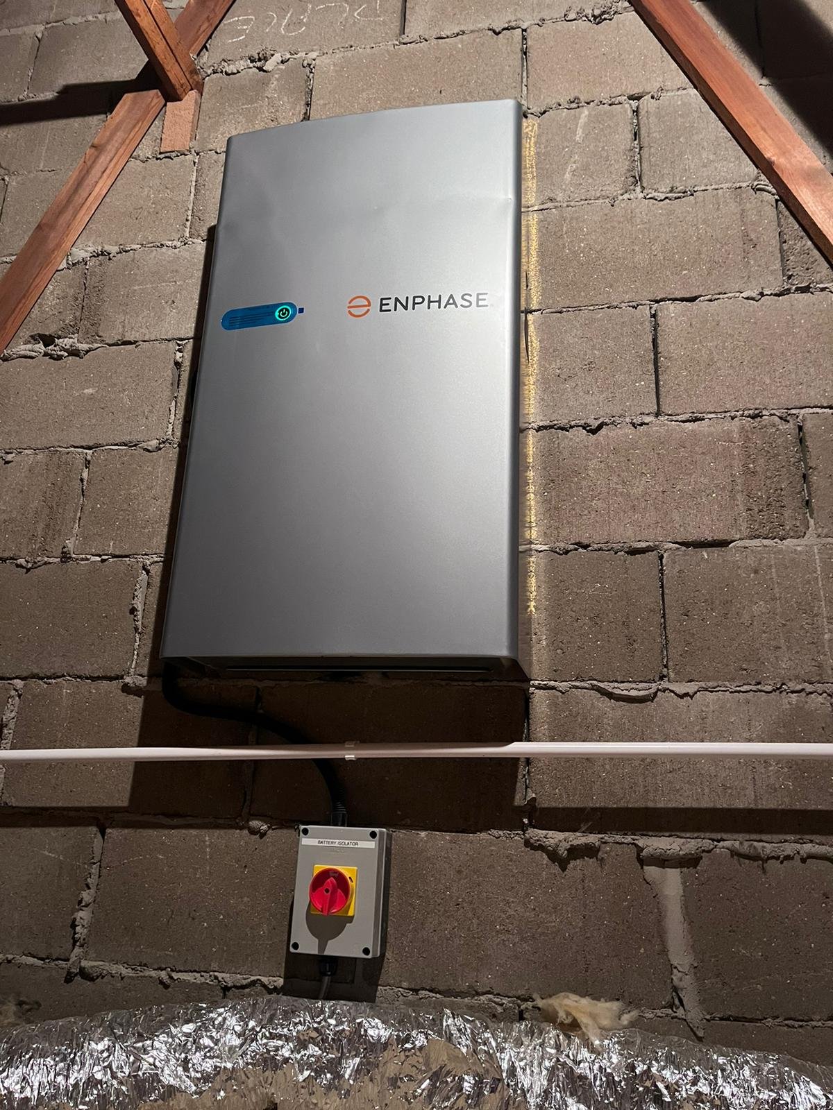 Enphase battery mounted in loft solar.jpeg